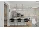 Modern kitchen featuring sleek countertops, stainless steel appliances, and bar seating at 712 Proud Eagle Ln, Las Vegas, NV 89144