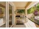 Inviting outdoor kitchen with a built-in grill and countertop, perfect for entertaining at 712 Proud Eagle Ln, Las Vegas, NV 89144