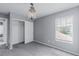 Neutral bedroom with closet, carpet flooring, and updated chandelier lighting at 776 Anacapri St, Las Vegas, NV 89138