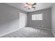 Carpeted bedroom with ceiling fan, closet and window at 776 Anacapri St, Las Vegas, NV 89138