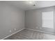 Empty bedroom with carpeting and a bright window at 776 Anacapri St, Las Vegas, NV 89138