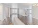 Bright, open-concept living room with dark wood floors and neutral paint at 776 Anacapri St, Las Vegas, NV 89138