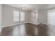 Spacious living room with laminate floors, neutral color, and natural light at 776 Anacapri St, Las Vegas, NV 89138
