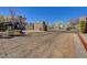 Brick-paved community entrance with gated access and beautifully landscaped surroundings at 8261 Golden Flowers St, Las Vegas, NV 89139