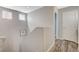 Upstairs hallway featuring wood-look floors and natural lighting at 8261 Golden Flowers St, Las Vegas, NV 89139