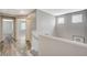 Spacious hallway featuring wood-look floors and natural lighting at 8261 Golden Flowers St, Las Vegas, NV 89139