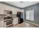 Corner kitchen showcasing the countertops, appliances, and cabinetry at 8261 Golden Flowers St, Las Vegas, NV 89139