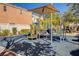 Fun playground with slides and climbing structures offers outdoor fun for  at 8261 Golden Flowers St, Las Vegas, NV 89139