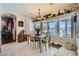 Cozy dining area with a view of the pool, showcasing natural light and charming decor at 8325 Villa De Medici St, Las Vegas, NV 89131