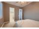 View of bedroom with walk-in closet and plush carpeting at 8705 Killians Greens Dr, Las Vegas, NV 89131