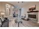 Comfortable living room with a fireplace and an open layout, perfect for Gathering gatherings at 8705 Killians Greens Dr, Las Vegas, NV 89131