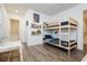 Cozy bedroom featuring a bunk bed and a bathroom, perfect for children at 881 Cherry Glen Pl, Las Vegas, NV 89138