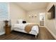 Cozy bedroom featuring a comfortable bed, modern decor, and a side table at 881 Cherry Glen Pl, Las Vegas, NV 89138