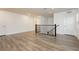 Spacious open loft area with wood floors and natural light, ideal for versatile living at 881 Cherry Glen Pl, Las Vegas, NV 89138