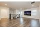 Bright loft area featuring wood floors, plantation shutters, and stairway with decorative metal railing at 881 Cherry Glen Pl, Las Vegas, NV 89138