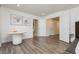 Spacious main bedroom with white walls, modern art and vinyl plank flooring at 881 Cherry Glen Pl, Las Vegas, NV 89138