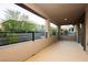 A covered patio with a view showcases an outdoor living space perfect for relaxation or entertaining guests at 881 Cherry Glen Pl, Las Vegas, NV 89138