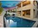 Backyard showcasing a sparkling pool, outdoor dining, seating, and built in BBQ at 881 Cherry Glen Pl, Las Vegas, NV 89138