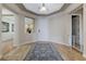 Elegant foyer with tray ceilings, tile floors, and an open layout at 9243 White Waterfall Ave, Las Vegas, NV 89149