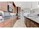 Well-equipped kitchen with stainless steel appliances and granite counters at 9243 White Waterfall Ave, Las Vegas, NV 89149