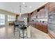 Modern kitchen with stainless steel appliances, granite counters, and large center island at 9243 White Waterfall Ave, Las Vegas, NV 89149