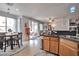 Open kitchen featuring a dining area, modern appliances, and lots of natural light at 9412 Jewel Lake Ave, Las Vegas, NV 89166