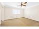 Large bedroom featuring neutral walls, carpet, and ceiling fan at 9465 Perennial View Ave, Las Vegas, NV 89148