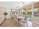Charming dining room with backyard views and access to outdoor entertaining area at 9465 Perennial View Ave, Las Vegas, NV 89148