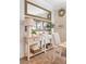 Nicely appointed dining room with designer console table and stylish accents at 9465 Perennial View Ave, Las Vegas, NV 89148