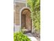 Ornate iron gate enhances the entrance, providing security and curb appeal to the residence at 9465 Perennial View Ave, Las Vegas, NV 89148