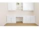 Close-up of built-in office desk and cabinets with ample storage at 9465 Perennial View Ave, Las Vegas, NV 89148