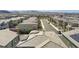 An aerial view of a neighborhood showcasing the layout, streetscape and proximity to amenities at 9732 Abel Cliff St, Las Vegas, NV 89143