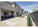 Backyard featuring patio, water feature, gravel, and small section of grass at 9732 Abel Cliff St, Las Vegas, NV 89143