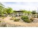 Park with shade structure, walking path, landscaping, and desert features at 9732 Abel Cliff St, Las Vegas, NV 89143