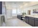 Modern main bathroom with dual vanities, separate glass shower, and soaking tub at 9732 Abel Cliff St, Las Vegas, NV 89143