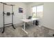 Bright office space featuring a pull-up bar, large window and neutral carpeting at 9732 Abel Cliff St, Las Vegas, NV 89143