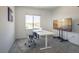 Bright office space featuring a large window with neighborhood views and neutral carpeting at 9732 Abel Cliff St, Las Vegas, NV 89143