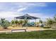 Neighborhood playground with slides, climbing structure, and shade structure at 9732 Abel Cliff St, Las Vegas, NV 89143