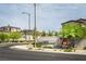Street view of community signage and nearby homes at 9732 Abel Cliff St, Las Vegas, NV 89143