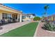 Serene backyard featuring artificial turf and landscaping at , Las Vegas, NV 89149