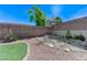 Low maintenance backyard with rock landscaping and artificial turf at , Las Vegas, NV 89149