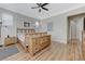 Comfortable bedroom featuring hardwood floors, a ceiling fan, and a dresser at , Las Vegas, NV 89149
