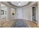 A welcoming foyer boasts neutral decor, a view of the front door, and an adjacent gate at , Las Vegas, NV 89149
