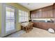 Breakfast nook off kitchen features dark wood cabinets and granite countertops at , Las Vegas, NV 89149