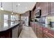 A kitchen boasts stainless steel appliances, granite countertops, and tile flooring at , Las Vegas, NV 89149