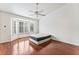 Bedroom boasts gleaming wood floors and bright bay window, perfect for relaxation at 10029 Netherton Dr, Las Vegas, NV 89134