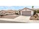 Lovely single-story home with low-maintenance landscaping, concrete driveway, and two-car garage at 10029 Netherton Dr, Las Vegas, NV 89134