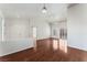 Open living space with wood flooring, neutral paint, vaulted ceilings, and plenty of natural light at 10029 Netherton Dr, Las Vegas, NV 89134