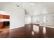 Bright living room features wood floors, vaulted ceilings, and ample natural light at 10029 Netherton Dr, Las Vegas, NV 89134
