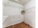 Walk-in closet with adjustable shelving and wood floors at 10029 Netherton Dr, Las Vegas, NV 89134